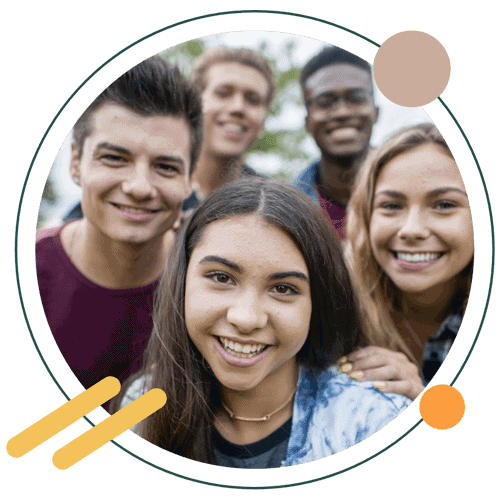 Diverse group of smiling teens in a friendly gathering, representing the community and support at Key Healthcare's residential treatment program